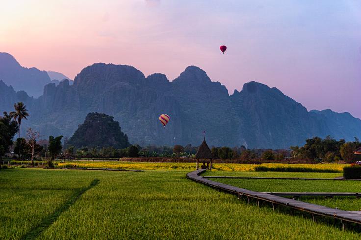 Shot at sunset of Vieng Tara rice field in Vang Vieng, Laos